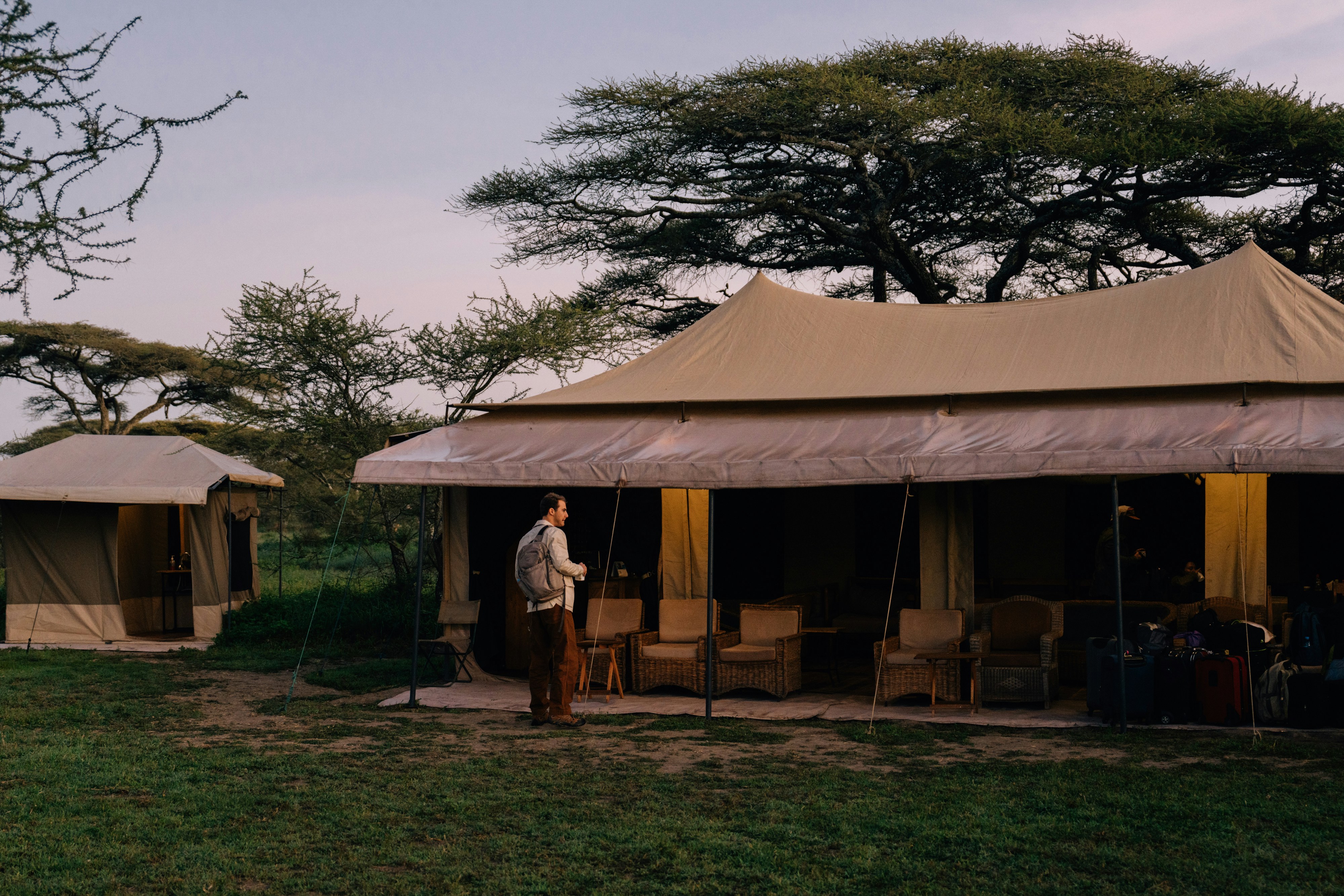 Open-front luxury safari tent overlooking the plains